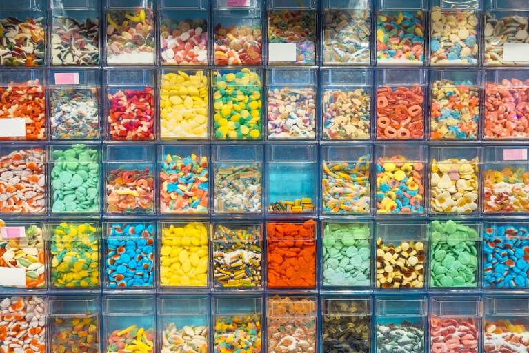 wall of gummy candies in a candy store